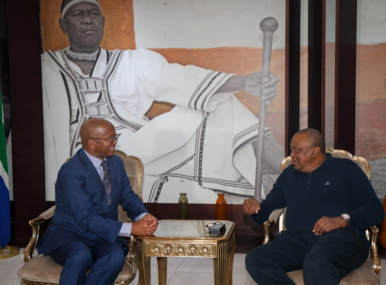 Former President Uhuru Kenyatta interacts with officials upon arrival in South Africa on Saturday, May 25, 2024. Photo: UHURU KENYATTA/X