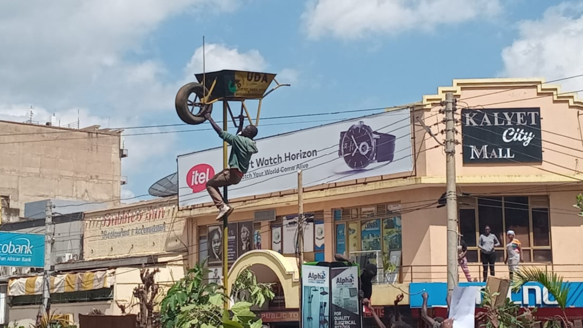 Angry residents pull down UDA wheelbarrows during anti-Finance Bill protests in Eldoret
