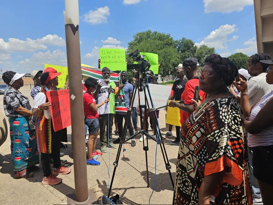 Roots party leader George Wajakoyah leading Kenyans in Dallas, US during protests against Finance Bill 2024. PHOTO/Wajakoyah/Facebook. 