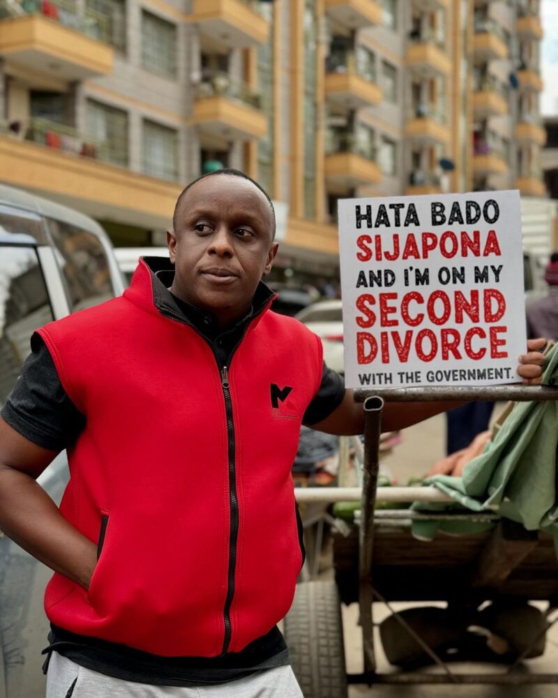 Phil Karanja's bold placard message resonated deeply with many, echoing widespread frustration with current government policies. Photo: Philip Karanja/Instagram