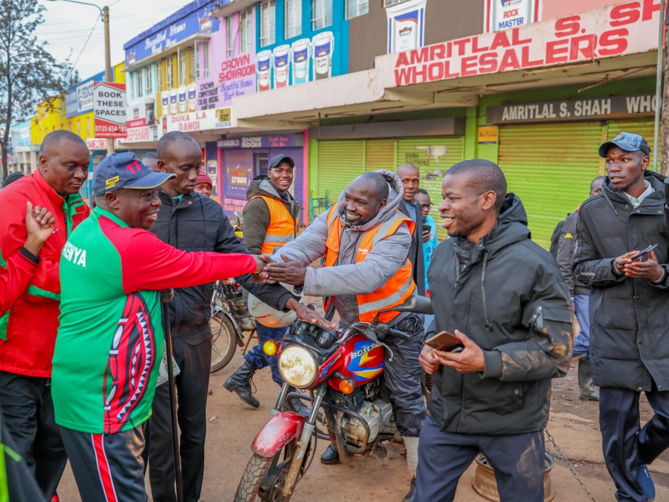 Riggy G interacts with Eldoret City residents as he takes routine morning walk