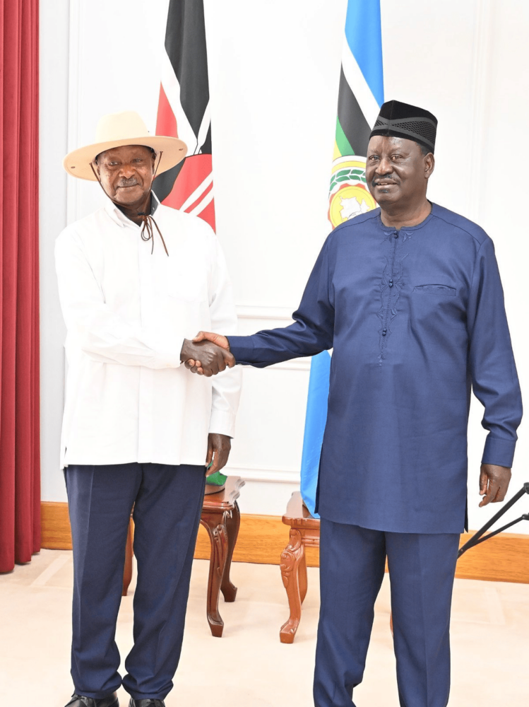 Ugandan President Yoweri Museveni shakes hand with AUC Candidate Raila Odinga at State House during Raila's AUC bid. Photo: Yoweri Museveni/X 