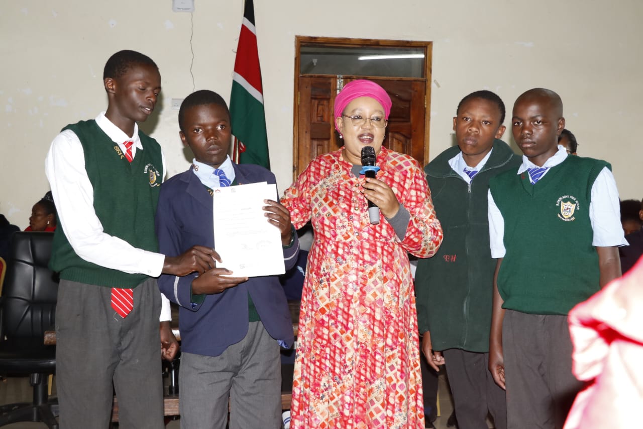 Nyandarua Woman Representative Faith Gitau disturbing bursary cheques to students on Friday August 23, 2024. Photo/Laban Muhinda/TV47 