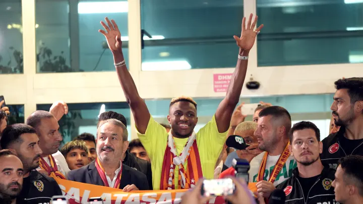 Victor Osimhen signature mask in Galatasaray colors with the quote, "The masquerade is about to start. You are all invited," announcing his transfer to the club.