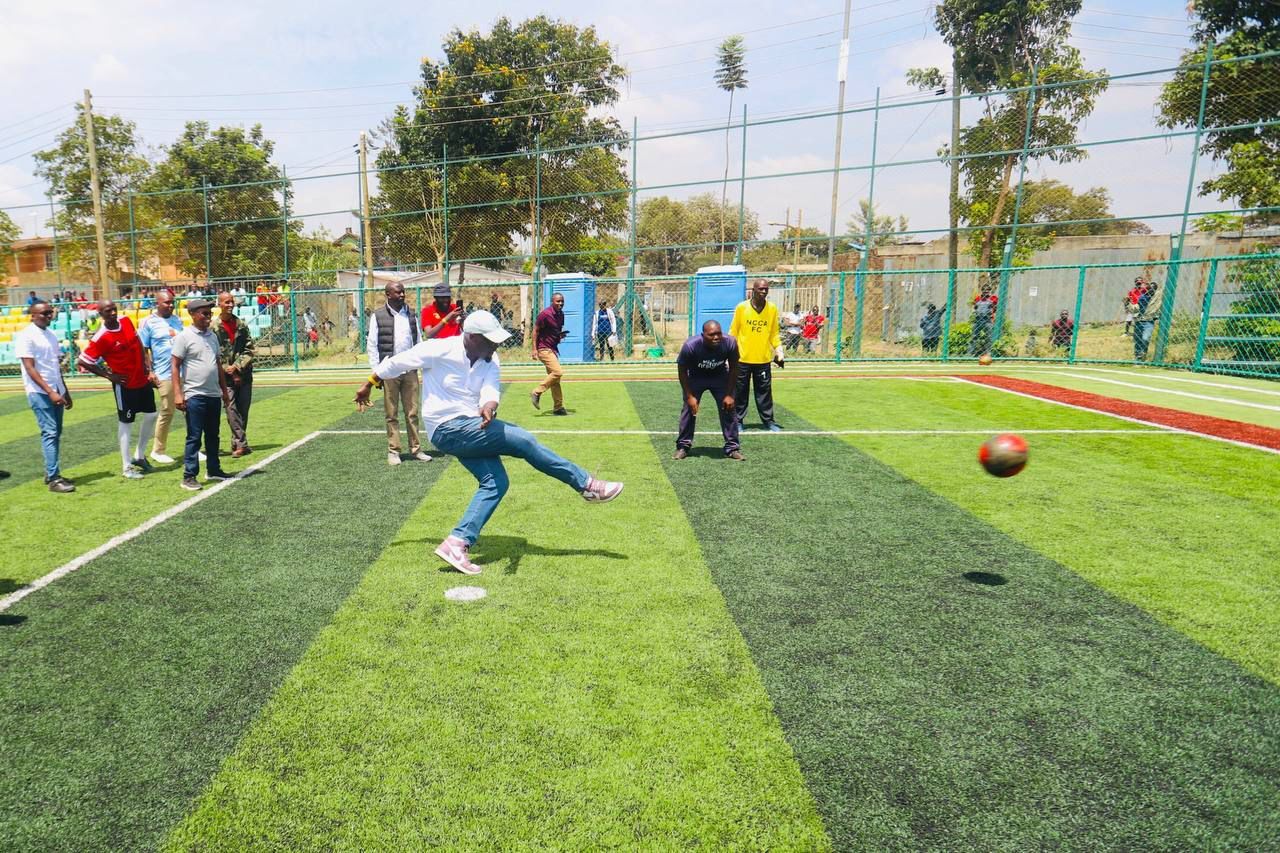 Governor Johnson Sakaja kicking the ball at a stadium in Nairobi. Photo/Mike Kaguongo/TV47