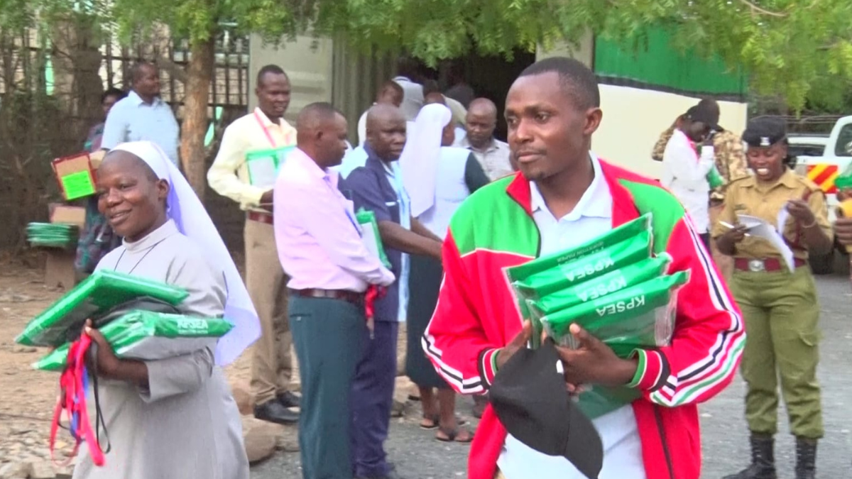 Supervisors picking KAPSEA exams from a centre in West Pokot County. Photo/TV47