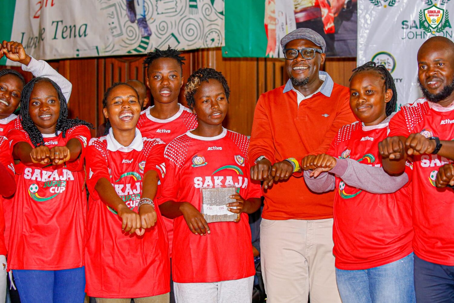 Ladies' champions Shrink Pack Starlets pose with their Ksh 1 million prize.