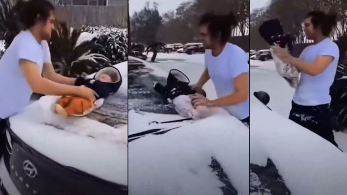 Man in trouble after using 3-month-old baby to wipe snow off his car for TikTok video